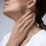 Woman with sore throat or swollen glands