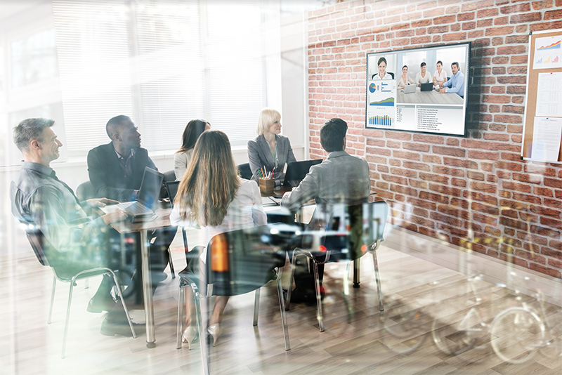 Meeting workshop at a business conference room with a video connection